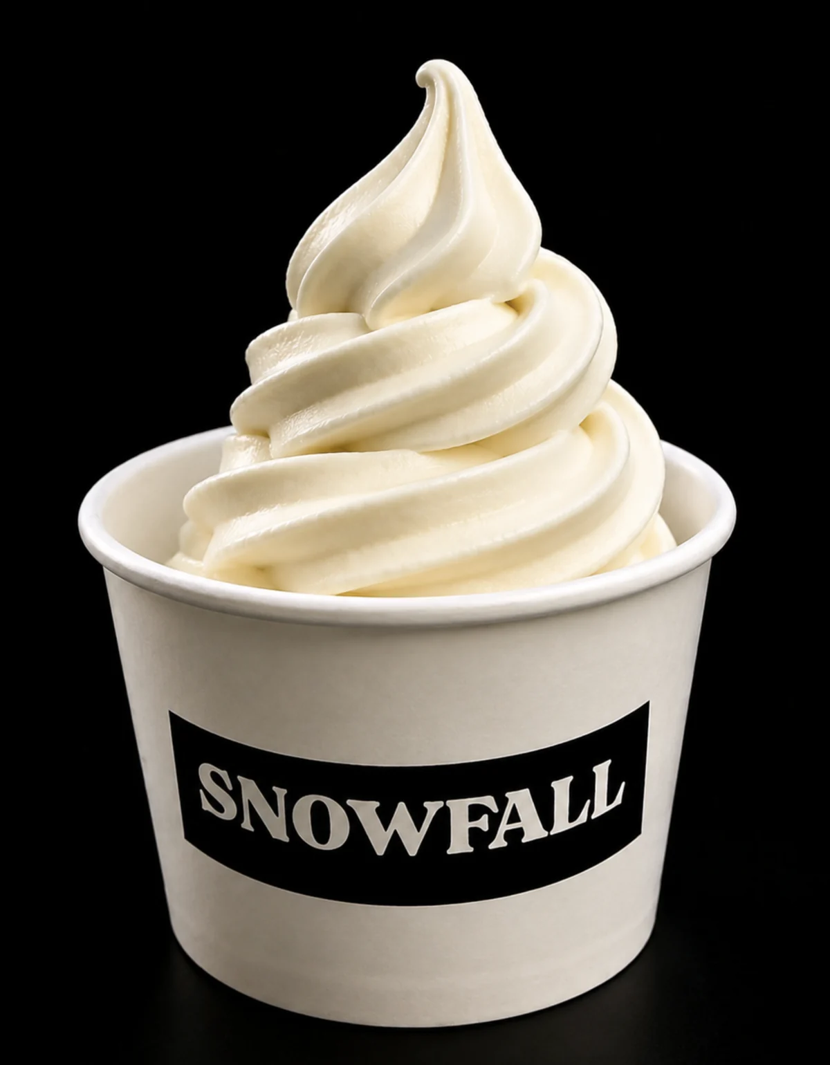 A plain snowfall — Greek froyo swirled high in a SNOWFALL cup, on black